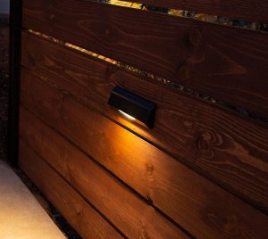 Surface-Mounted Outdoor Wall and Step Light with Specialized Optics for Wall-Washing and Ground-Washing Effects