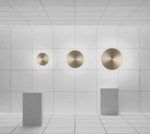 Minimalist Gold Anodized Aluminum Wall Light with Rotatable Disk for Soft Dimmable Ambient Lighting