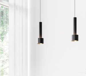 Architectural Pendant Light with Cylindrical Housing and Up-Glow Highlighting