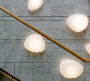 Artistic and Functional Architectural Wall Light with Pebble-Inspired Shapes and Opal Glass Diffuser