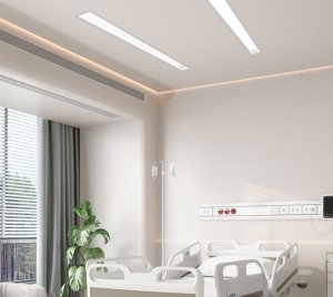 Patient Room Asymmetric Overbed Fixture with Reading, Ambient, and Exam Lighting Options