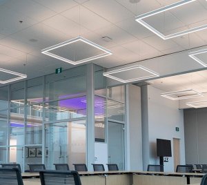 Modern Suspended LED Fixture with Power over Ethernet (PoE) Integration for Smart Building Applications