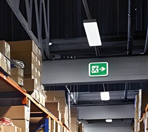 Wall-Mounted Emergency Exit Sign With High Visibility and DIN 4844 Compliance