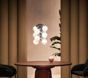 Artistic Vine-Inspired Chandelier Light with Poised Arc Repetition and Opal Glass Globes