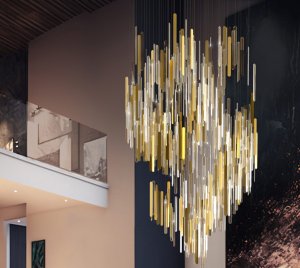 Golden Acrylic and Metallic Chandelier Light Inspired by Sunshowers with Suspended Stainless Steel Cables