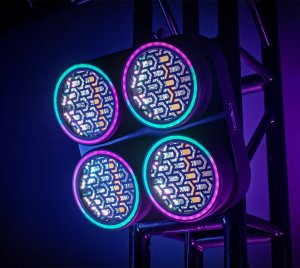 Quad-Cell LED Blinder with RGB Aura Background, Ring Effects, and Sound-Active Control for Theatrical and Event Lighting