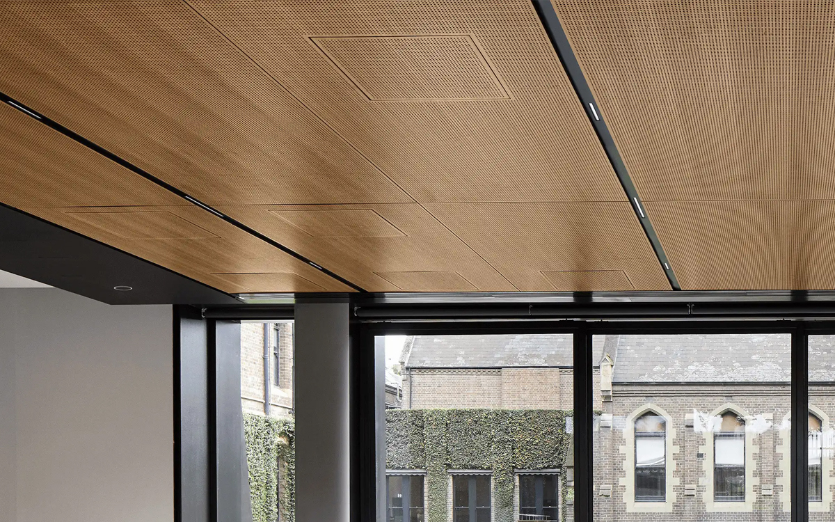 Adjustable Recessed Linear LED Luminaire with Ultra-Narrow Optics for Seamless Architectural Integration