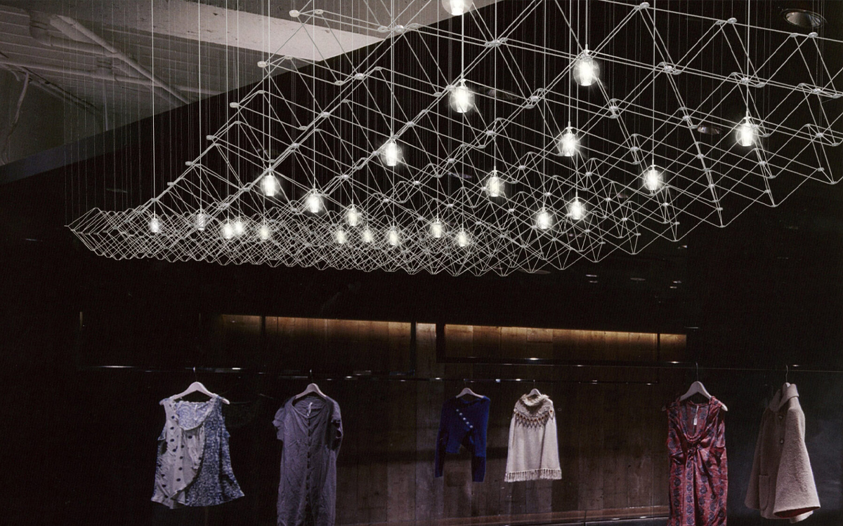 Architectural Statement Chandelier with Suspended Trapezoid Framework, Clear Glass LED Spheres, and Silver Metal Construction