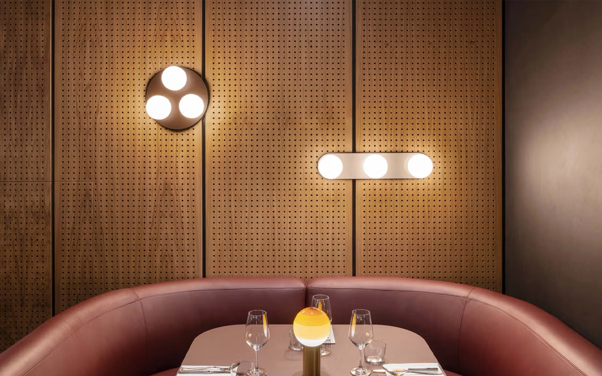 Art Deco Inspired Wall Sconce with Opal Glass Globe and Customizable Backplate Finishes