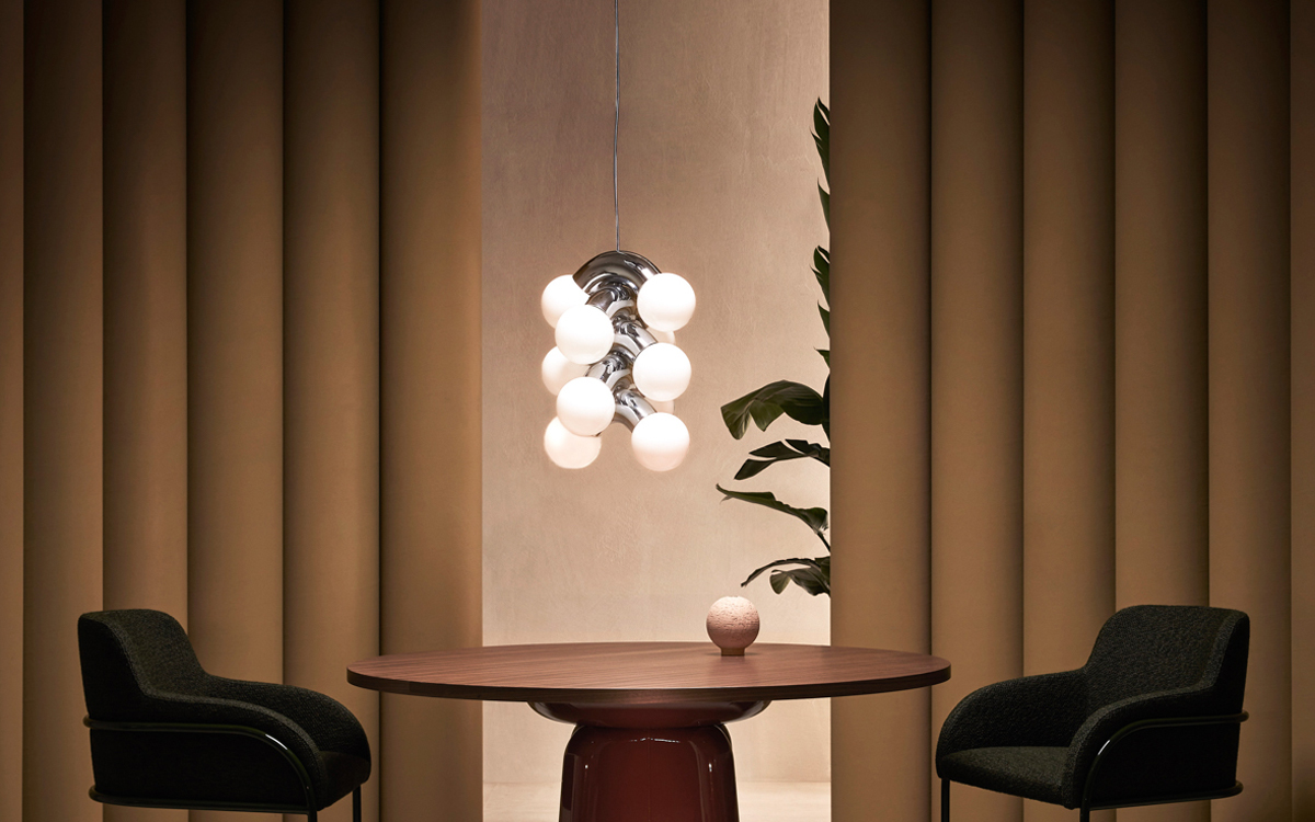 Artistic Vine-Inspired Chandelier Light with Poised Arc Repetition and Opal Glass Globes
