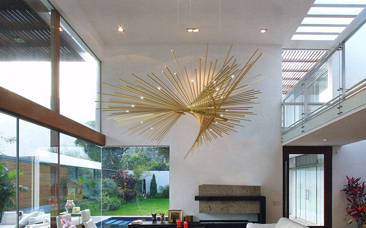 Celestial Chandelier Light with Brass Rods and Pinpoint LED Bulbs Creating a Starry Night Effect