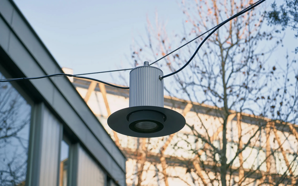 LED Catenary Light with Symmetric and Asymmetric Optics for City Streets and Pedestrian Walkways