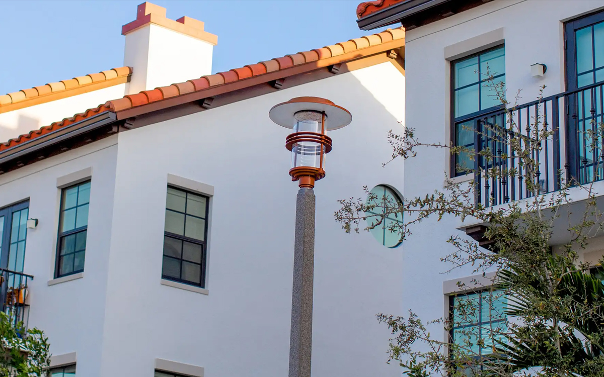 LED Post Top Lighting Fixture with Tall Cylindrical Form and Architectural Styling
