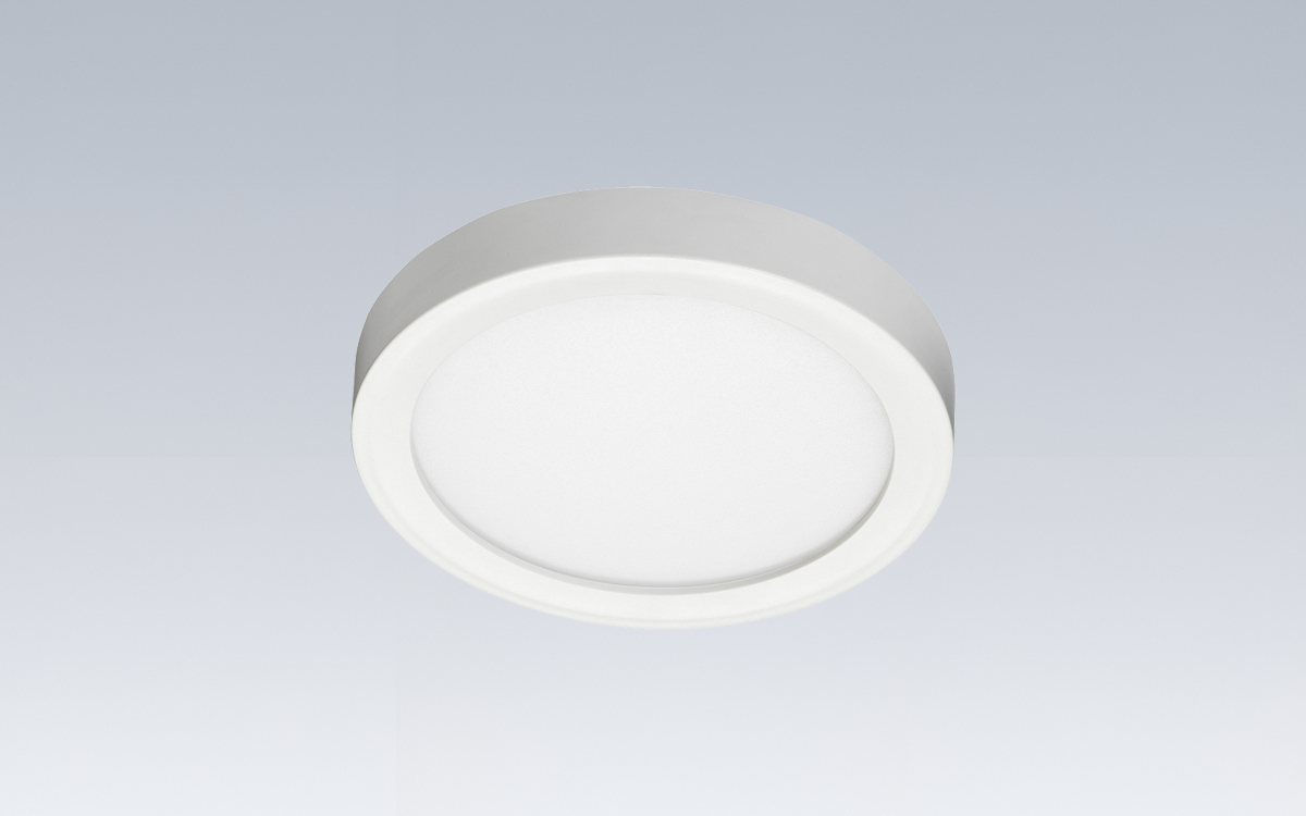 Low Profile Round Surface Mount LED Downlight with Field Installable Trim Inserts for Corridors, Hallways, and Pantries