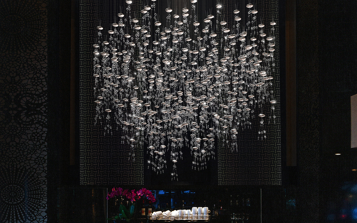Luxury Chandelier Light with Sparkling Chrome Pebbles and Faceted Glass Crystals for Dramatic Interiors