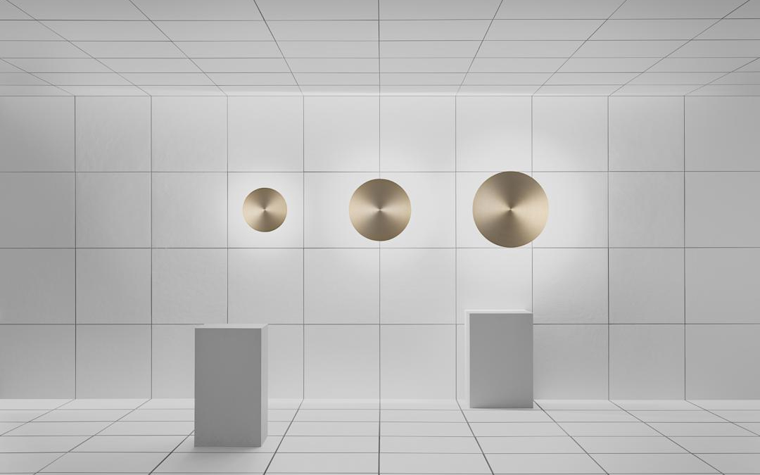 Minimalist Gold Anodized Aluminum Wall Light with Rotatable Disk for Soft Dimmable Ambient Lighting