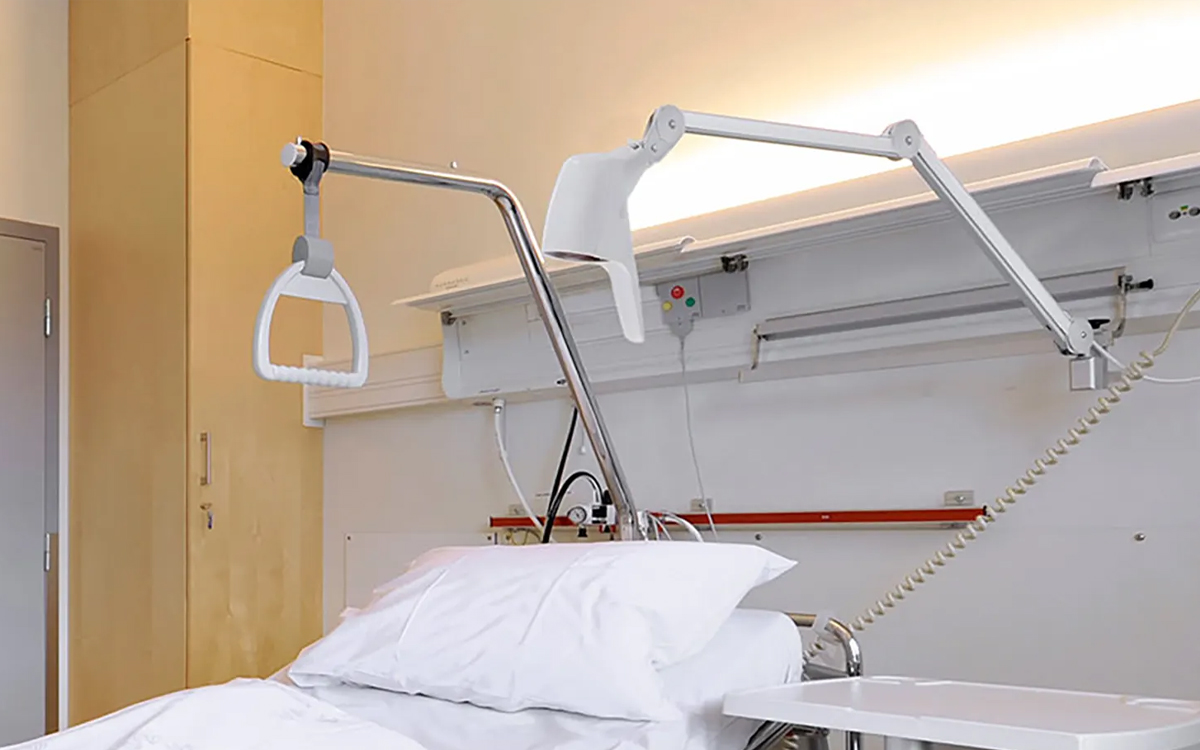Patient Room Bedhead LED Examination Light with Integrated Dimming Control System and Antimicrobial Protective Finish