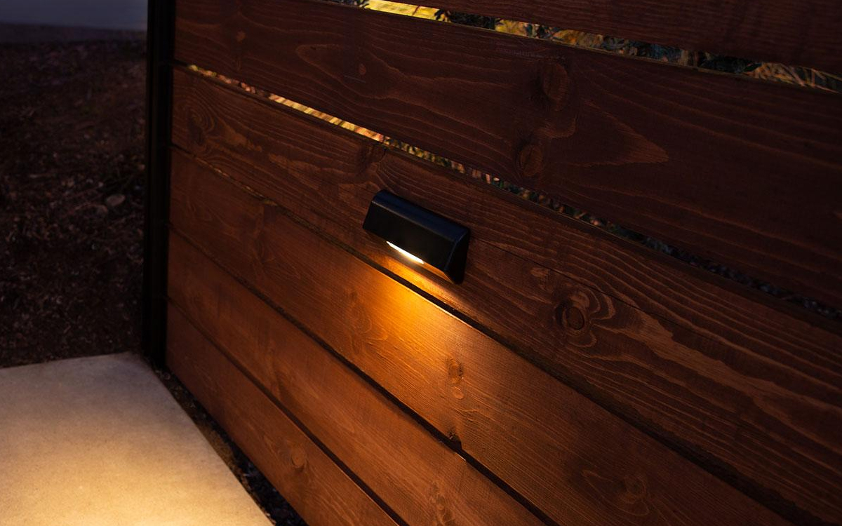 Surface-Mounted Outdoor Wall and Step Light with Specialized Optics for Wall-Washing and Ground-Washing Effects